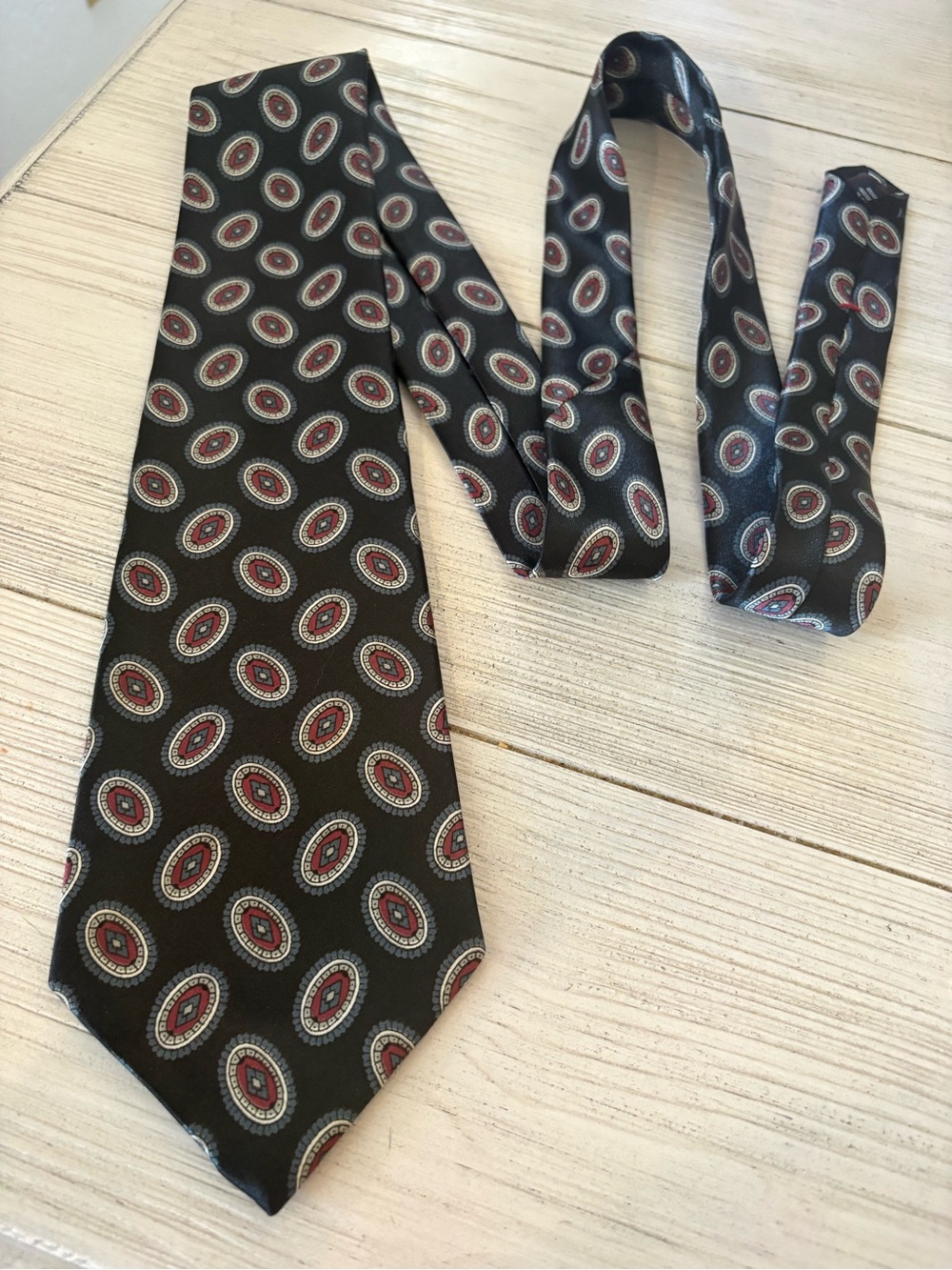 David Taylor Black Tie with Red and White Medallion Pattern